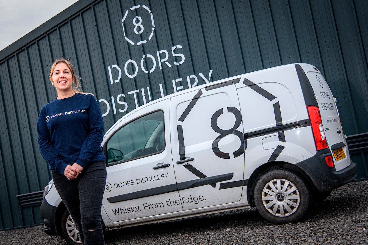 Kerry outside 8 Doors Distillery